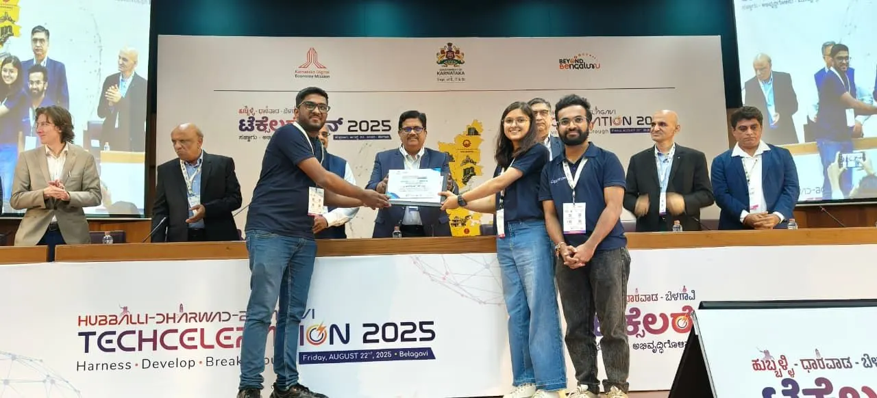 The Cipherion team receiving a certificate on stage at the Hubballi-Dharwad-Belagavi Techcelebration 2025 in Belagavi