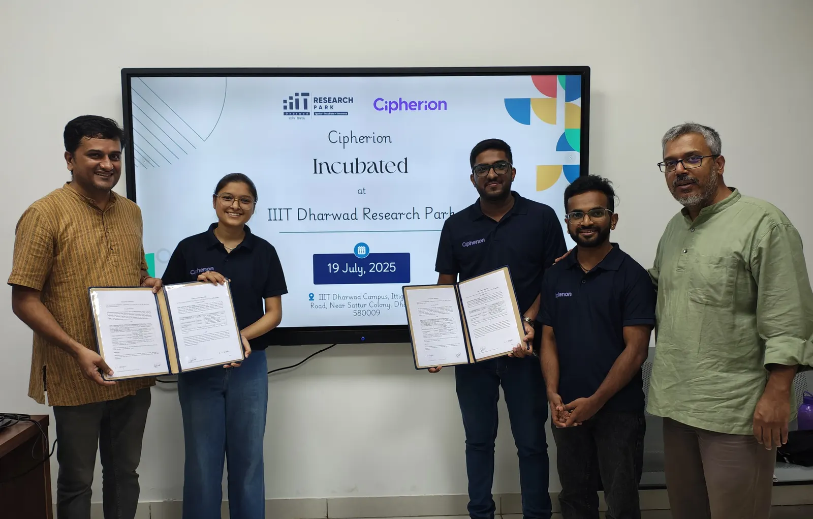 The Cipherion team holding the signed incubation agreement at IIIT Dharwad Research Park, with the IIIT Dharwad Research Park team