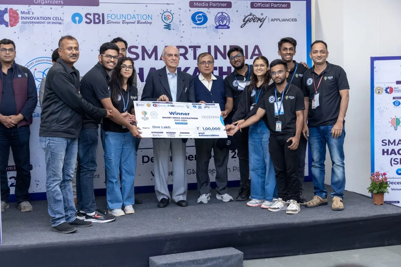 The Cipherion team on stage receiving the Smart India Hackathon 2024 winner's cheque for ₹1,00,000